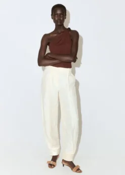 Asymmetric appliqué top