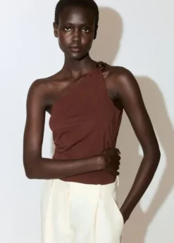 Asymmetric appliqué top