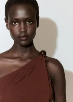 Asymmetric appliqué top