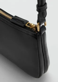 Crossbody bag with charms and rings