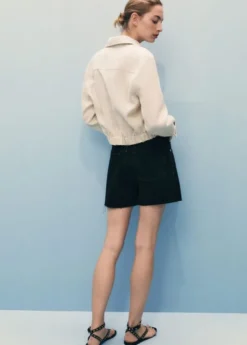 Denim shorts with frayed hem