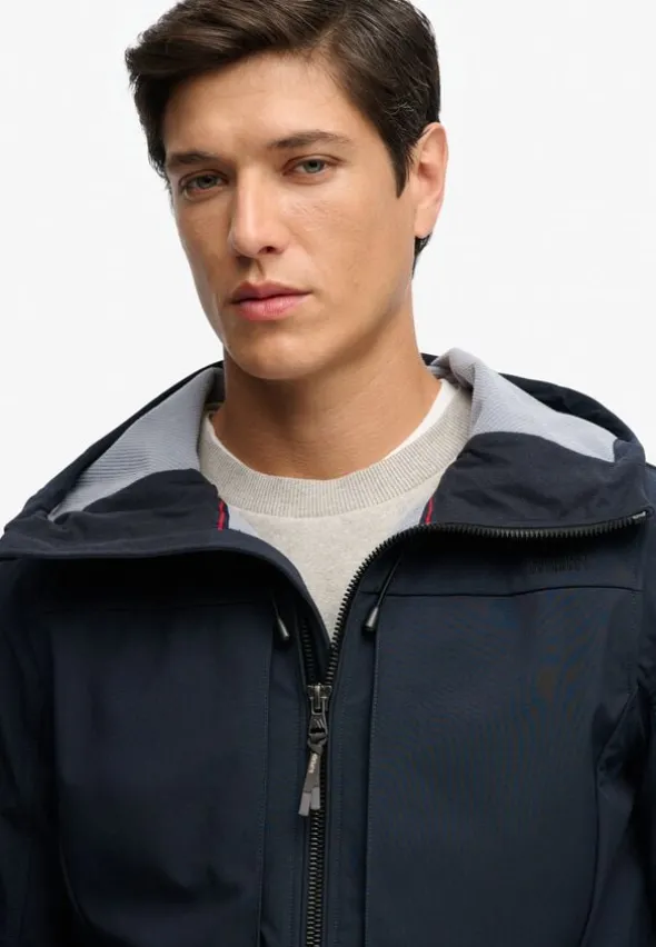 HOODED SOFTSHELL TREKKER JKT