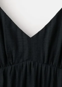 Textured dress with ruched detail