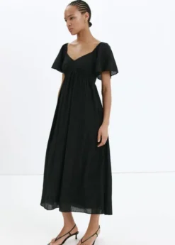 Textured dress with ruched detail