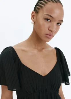 Textured dress with ruched detail