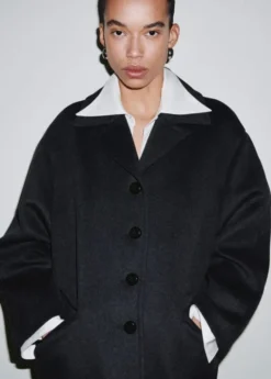 Wool-blend coat with button fasteni