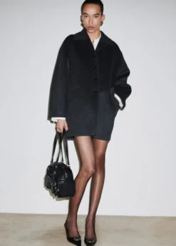 Wool-blend coat with button fasteni